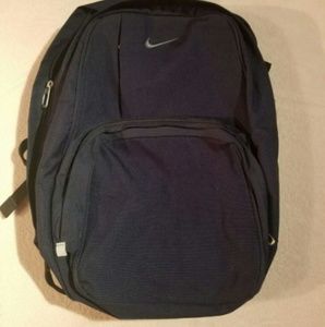 Dark blue and black nike backpack